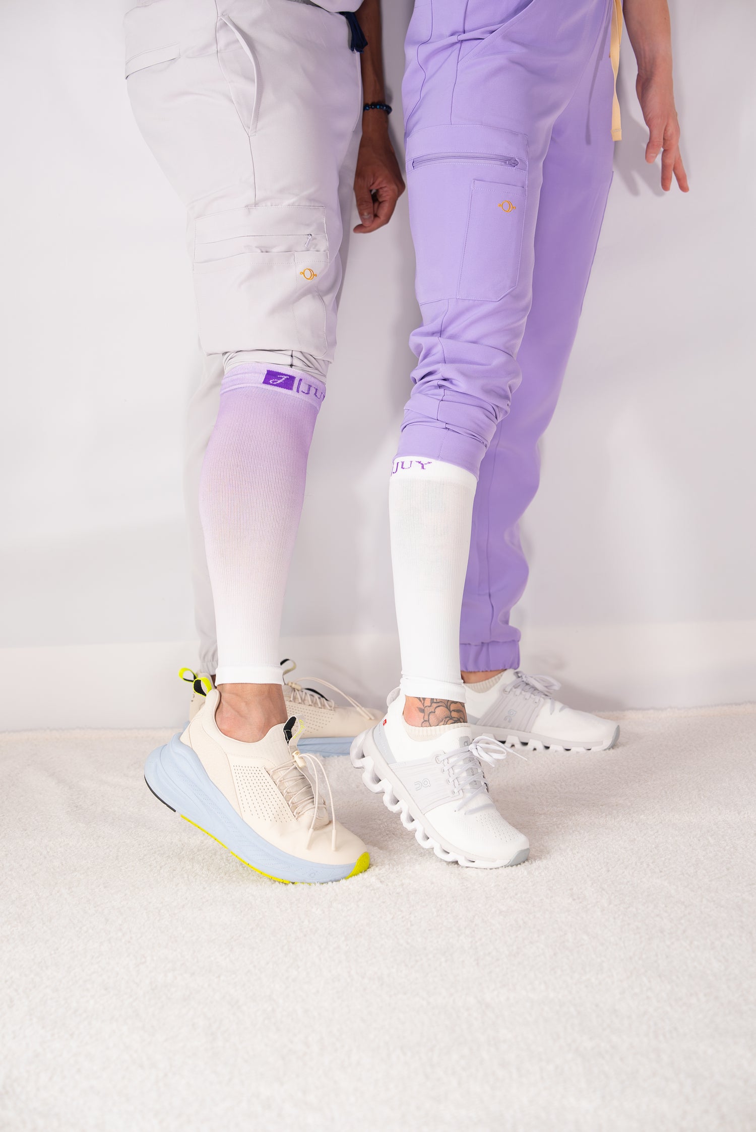 healthcare workers wearing compression leg/calf sleeves